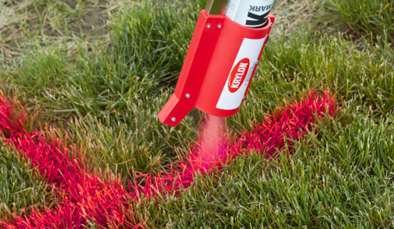 spraying and marking grass